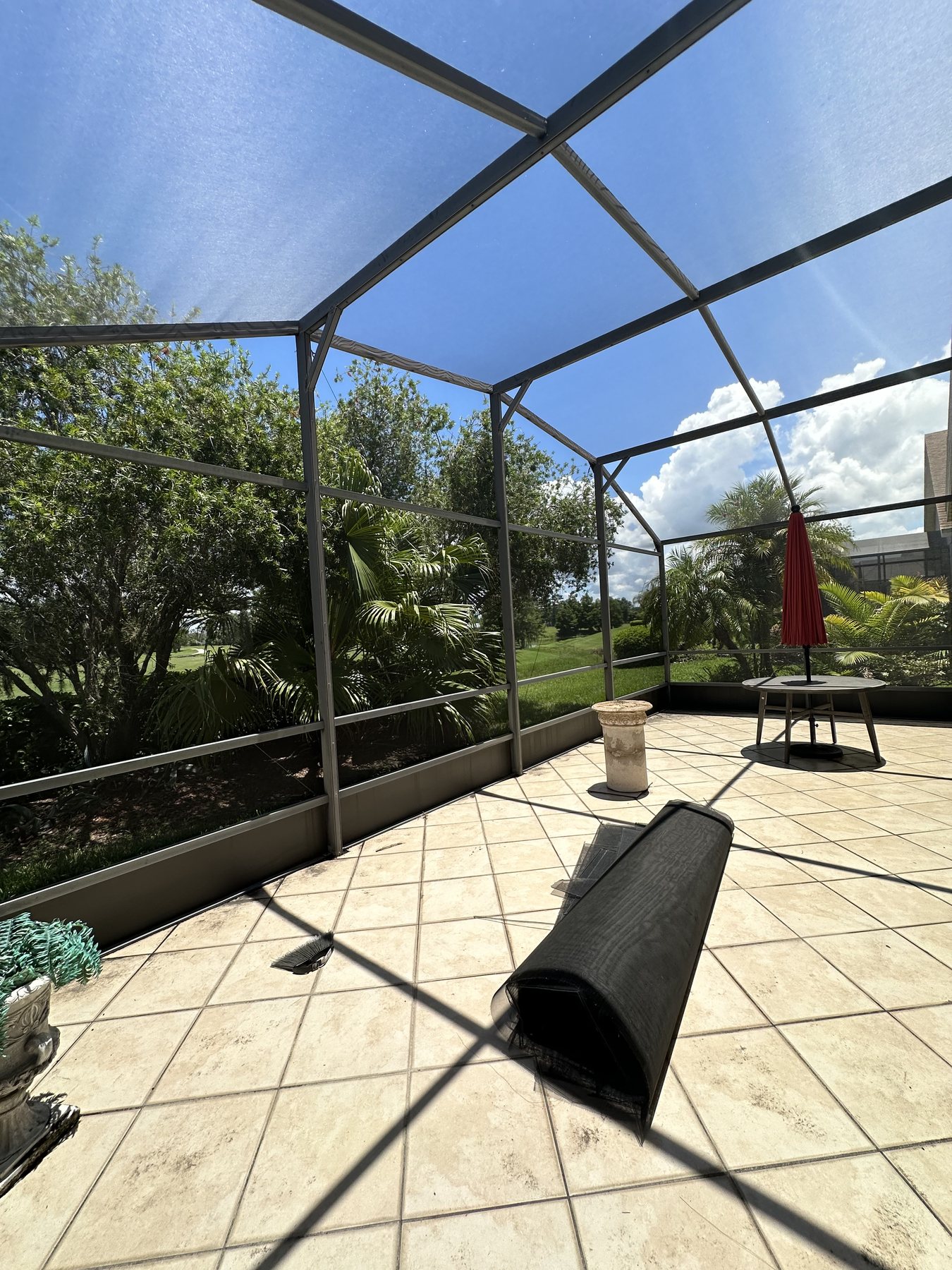 Pool enclosure frame prepared for new roof screen panels